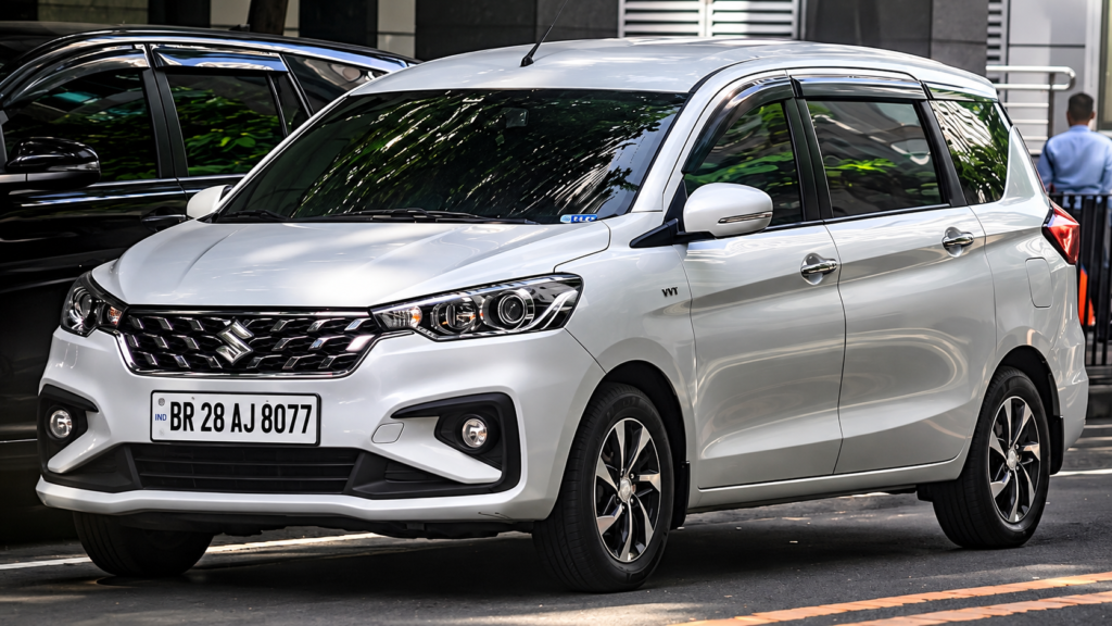 White Suzuki Ertiga for Rounak Travel with registration BR 28 AJ 8077